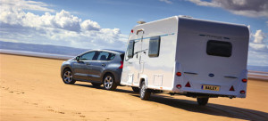 white touring caravan on the beautiful beach amazing for sweet escape from your everyday life